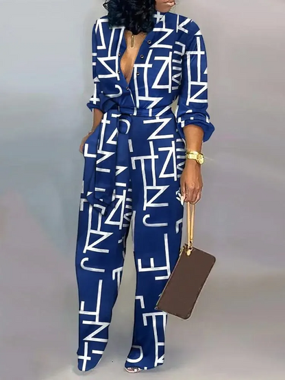 Juniper - Mode-jumpsuit met lange mouwen en veren met letterprint